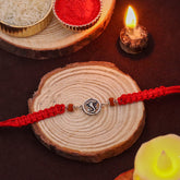 Silver Oxidized Ganeshji Blessing With Rudraksha Rakhi for Brother
